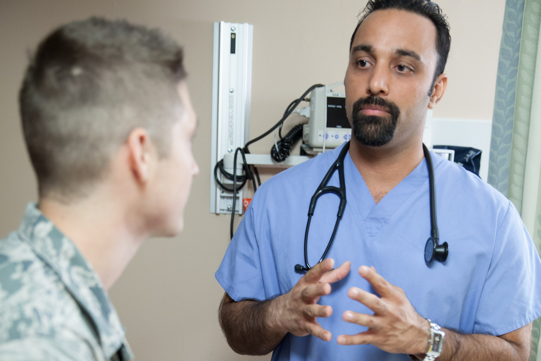 Doctor consults with patient