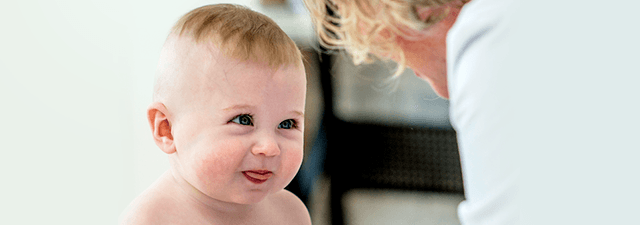 Benefits Link Button Image - a baby smiling